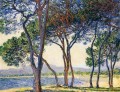 Árboles a la orilla del mar en Antibes Claude Monet